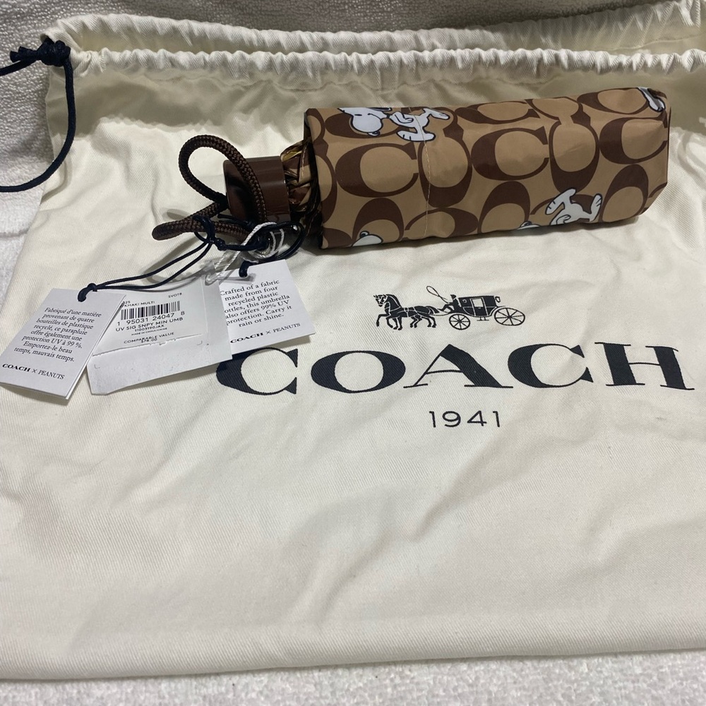 Coach signature UV umbrella UV protection small enough to fit in your purse.